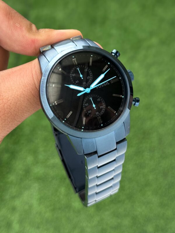 his 44mm Bronson features a black satin dial, chronograph movement and a blue metal strap. ✅ - Image 3