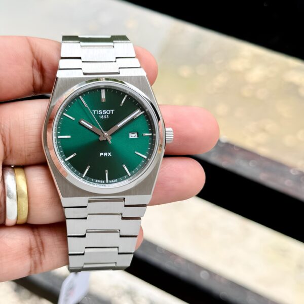 The Tissot PRX is a stylish and modern reinterpretation of a classic design making it a perfect blend of vintage aesthetics and contemporary craftsmanship. ✅ - Image 2