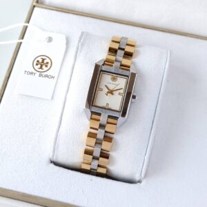 Beautifully polished and plated stainless steel adds luxe shine to an elegantly feminine bracelet watch with an easy-to-read dial in a distinguished vintage shape..  Tory Burch