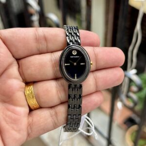 TORY BURCH THE OVAL BLACK-TONE – ELEGANCE IN EVERY CURVE